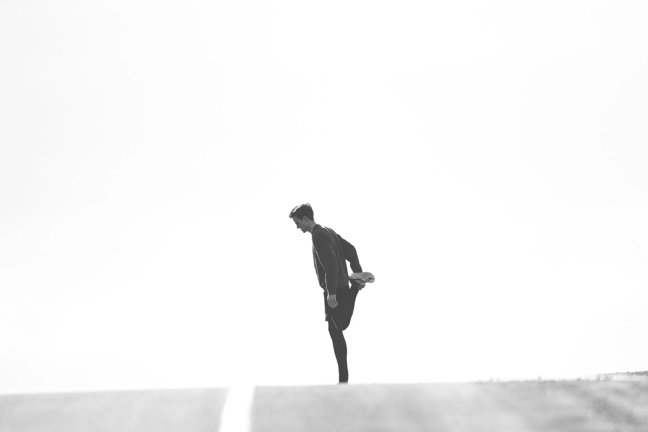 A person stretching outdoors